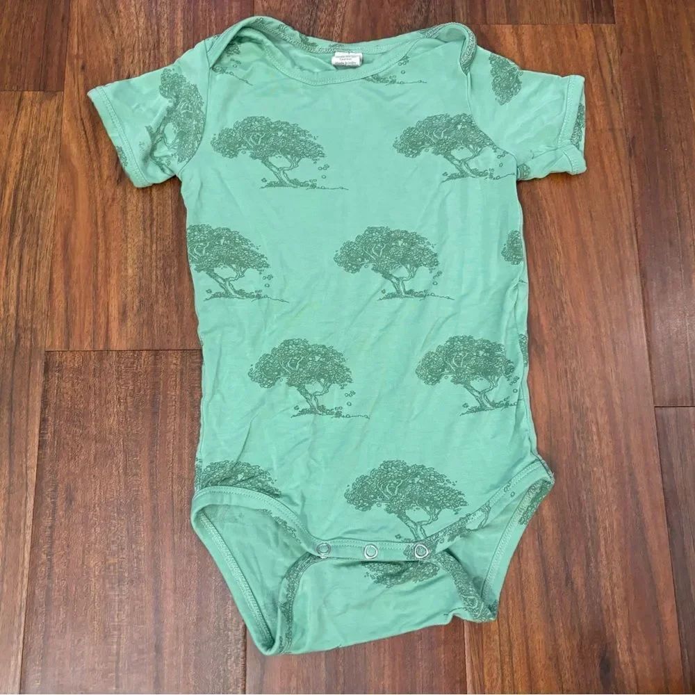 Kate Quinn green tree short sleeve onesie